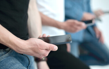 close up.a group of young people with smartphones