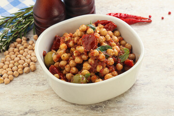 Chickpea beans with dry tomato and olives