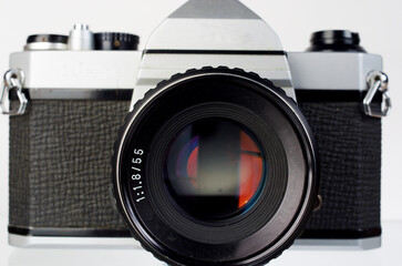 SLR camera on a white background. Close-up.