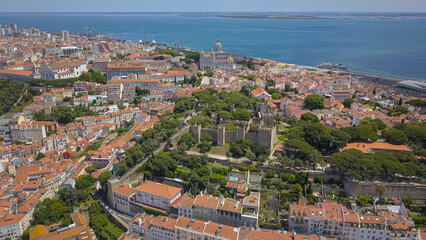 Obraz premium castle São Jorge with river Tejo and Cathedral behind in a sunny day