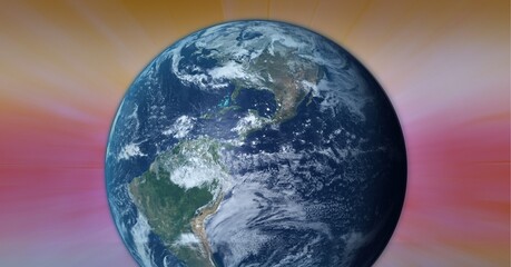 Digitally generated image of globe against light trails on pink background