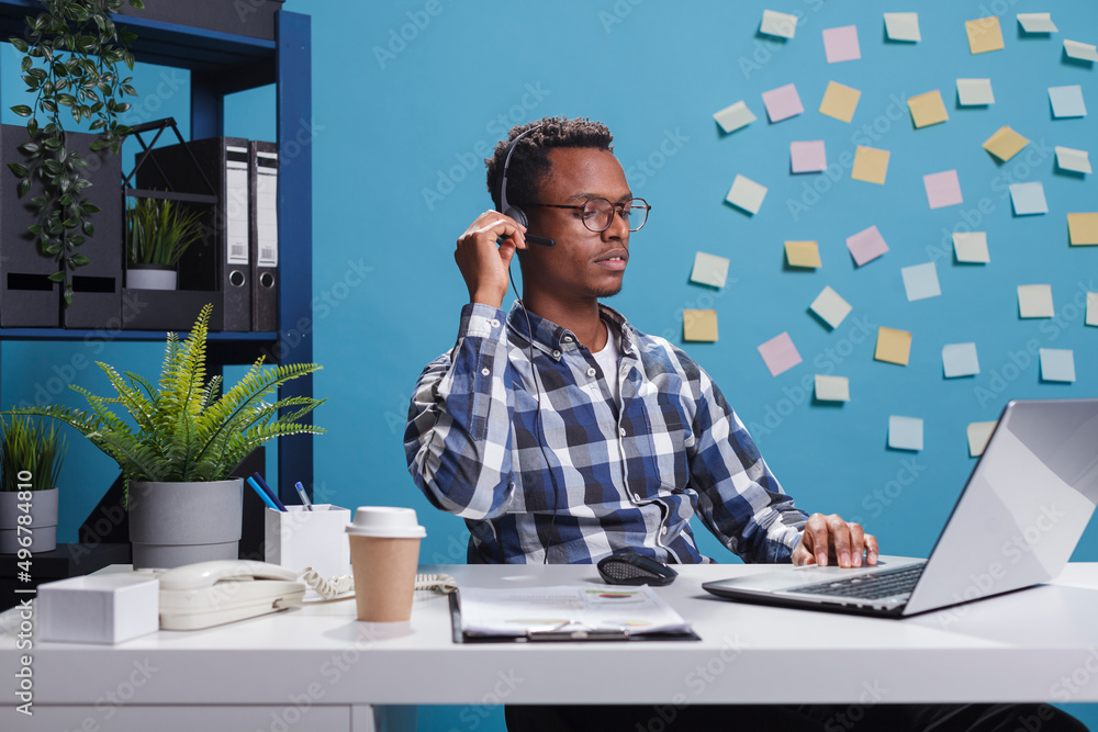 Poster customer care consultant operator on phone call with client requesting help regarding application do