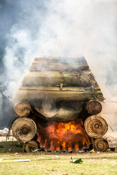 Traditional Balinese cremation ceremony in front of a temple