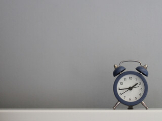 alarm clock on the table