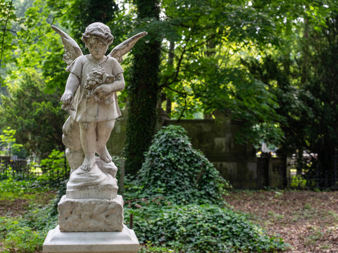 Tombstone, Stone statue of a little angel, Poland
