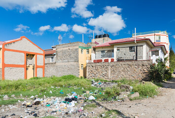 Garbage Behind Colorful Buildings, Kenya