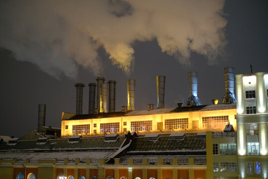 View of the smoke coming from the factory chimneys.