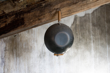 Hanging wok from the ceiling - obrazy, fototapety, plakaty