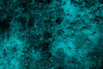 Fototapeta na wymiar Dark cyan color abandoned concrete wall surface with heavy grunge texture for background