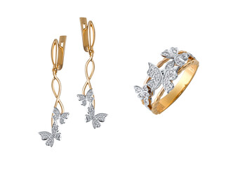 Closeup shot of the gold earrings and ring with diamond butterflies isolated on the white background