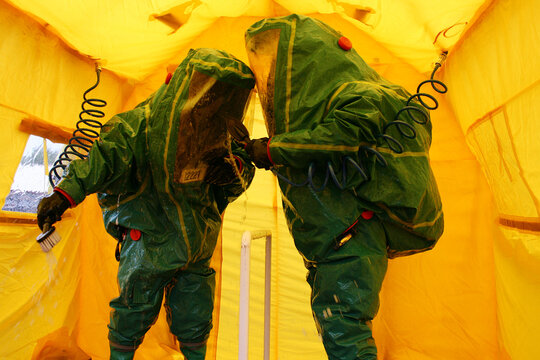 Chemical Incident. Decontamination Unit. Exposed To A Chemical Contaminated Hot Zone. Chemical. Biological. Radiological And Nuclear Defence Are Protective Clothing