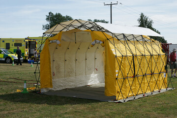 chemical warfare. decontamination unit. exposed to a chemical contaminated hot zone. Chemical....