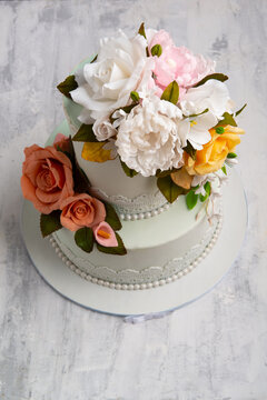 Top View Shot Of A Weeding Cake Designed By Flowers.