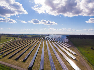 aerial view of solar panels on a sunny day.