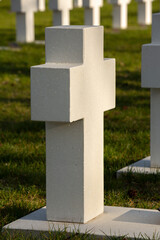 White cross In grass at war graveyard in Mortsel Belgium near Antwerp
