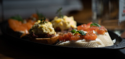 Delicious gourmet bruschetti in a fancy restaurant