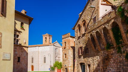 Fototapeta na wymiar 'Via San Francesco' (St Francis Street) in Perugia historical center with medieval church