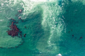 tasmanian coastal landscape in australia. aerial photos of rocky ocean views in southern tasmania. showing towns and farms.