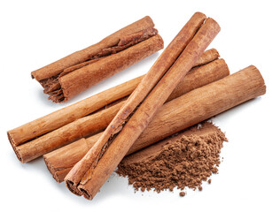 Cinnamon dried bark strips and cinnamon powder, sweet-smelling brown substance used in cooking, isolated on white background.