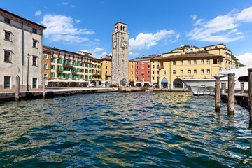 The Apponale tower and the port of Riva on Lake Garda. Riva del Garda, Trento province, Trentino Alto-Adige, Italy, Europe.