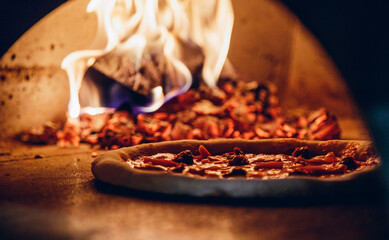 Closeup of pizza in the oven