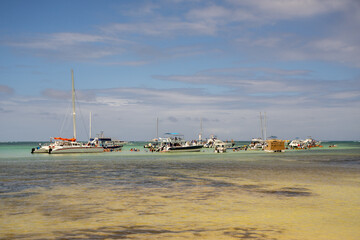 View of boats with people on natural pool in Punta Cana Dominican Republic