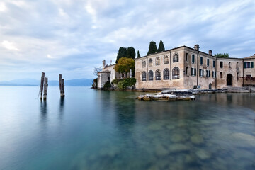 The Bay of Sirens in Punta San Vigilio. Lake Garda, Verona province, Veneto, Italy.