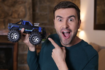 Man holding cool monster truck model