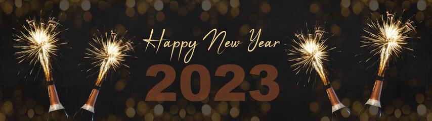 HAPPY NEW YEAR 2023 celebration Silvester New Year's Eve Party background banner panorama greeting card - Champagne bottles with fireworks on dark night texture with bokeh lights