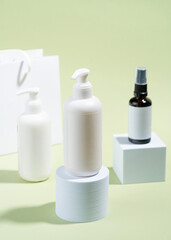 Blank white Bottles for Cosmetics, Mock up Cream Jar on a Olive Green background, Packaging for Cosmetics without logo and label