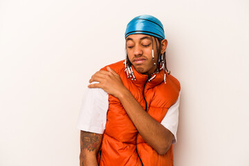 Young African American man isolated on white background having a shoulder pain.