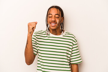 Young African American man isolated on white background celebrating a victory, passion and enthusiasm, happy expression.