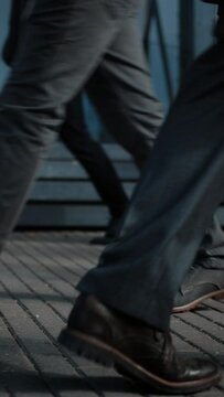 Close Up Leg Shot of a Business People Commuting to the Office on Foot. Managers and Businessmen Walk on a Crowded Street. People Dressed Smart. Video Footage with Vertical Screen Orientation 9:16.