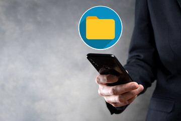 Businessman hold folder icon.Document Management System or DMS setup by IT consultant with modern...
