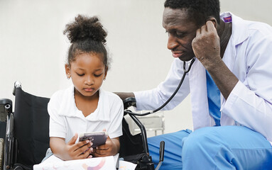 Black man doctor examining little girl patient heartbeat with stethoscope for proper treatment....