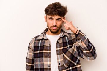 Young hispanic man isolated on white background pointing temple with finger, thinking, focused on a task.