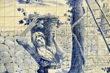 panels of azulejos represent the vineyards in the Sao Bento railway station, Porto, Portugal