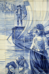 panels of azulejos represent the wine shipment down the Douro in the Sao Bento railway station, Porto, Portugal