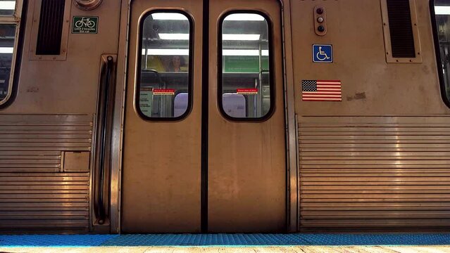 Closeup of Door On Subway Train Closing Then Leaving Station