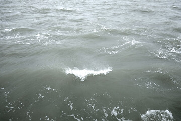 Closeup of ocean waves on a windy day