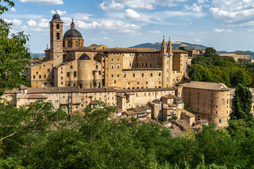 Beautiful shot of the Palazzo Ducale di Urbino building Heritage Site, Marche, Italy with blue sky