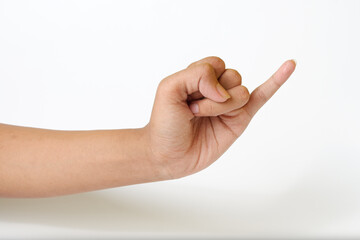 Adult female hand showing pinky little finger or gesture of making a promise on a white background - obrazy, fototapety, plakaty