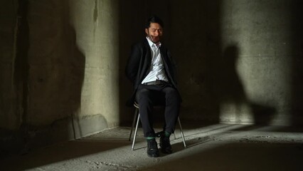 The male hostage was caught in a chair by the assailant, tape over his mouth, rope tied to his feet and hands, trying to resist releasing the rope. In prison