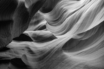 Grayscale shot of rock formations in a canyon