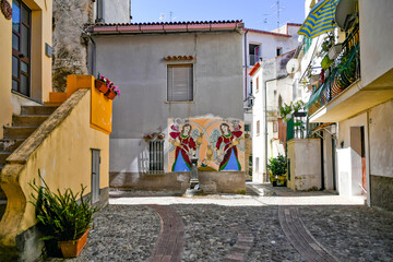 Narrow street in Diamante, a village in Calabria, Italy. - obrazy, fototapety, plakaty