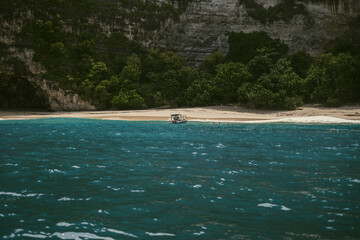 Boat trip on tropical islands. Incredible view of the beach and rocks. Bali, Nusa Penida, Nusa Lembongan