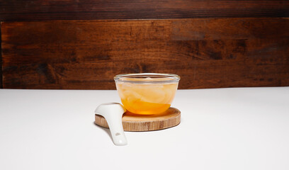 Toddy palm slices Thai dessert syrup in a clear cup on  white background