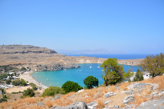 lindos bay with blue mediterranean sea, view from top of mountain