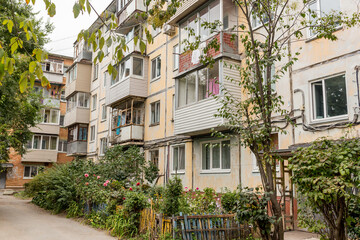 Courtyard of Khrushchyovka, common type of old low-cost apartment building in Russia and...