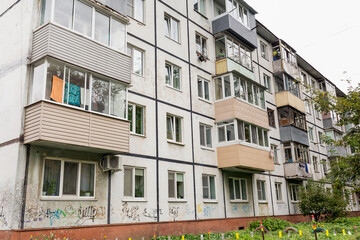 View of Khrushchyovka, common type of old low-cost apartment building in Russia and post-Soviet...